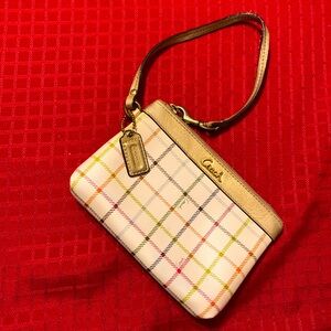 Coach cream and pastel plaid wristlet